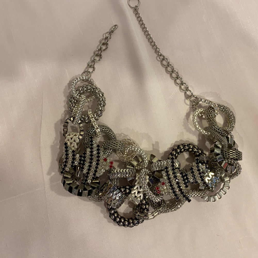 Choker necklace. Handcrafted. Rhinestone fish and textured metal rings.